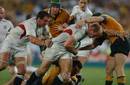 Lawrence Dallaglio carries the ball forward