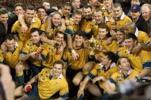 John Eales leads the celebrations with his victorious Wallaby side, France v Australia, World Cup final, Millennium Stadium, November 6 1999.