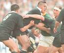 Jonah Lomu is stopped by South African defence