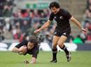 Tana Umaga dives in for a try against England