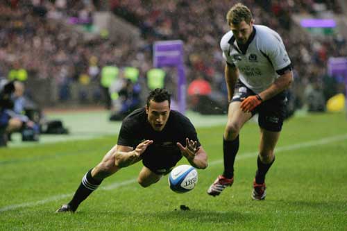 Rico Gear dives in to score against Scotland