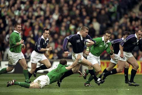 Glenn Metcalfe runs through the Irish defence