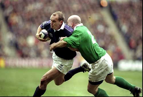 Gregor Townsend is tackled by Keith Wood