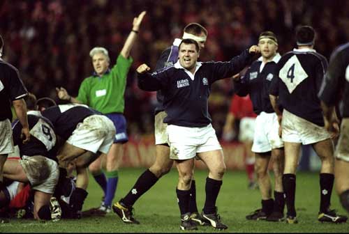 Dave Hilton celebrates victory over Wales