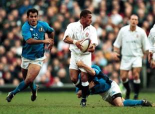 England wing Jason Robinson looks to offload after being caught by an Italian tackler, England v Italy, Six Nations, Twickrnham, February 17 2001.