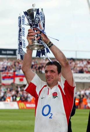 England captain Martin Johnson lifts the Six Nations trophy following England's Grand Slam victory over Ireland, Ireland v England, Six Nations, Lansdowne Road, March 30 2003.