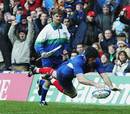 Olivier Magne dives for the corner against Scotland