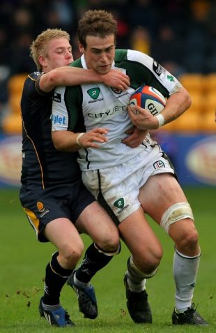 London Irish forward Jonathan Fisher is tackled by Worcester fly half Matthew Jones during the EDF Energy Cup Match between Worcester Warriors and London Irish at Sixways Stadium in Worcester, England on October 5, 2008. 