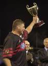 Todd Blackadder lifts the Super 12 trophy