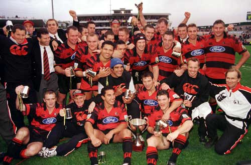 Crusaders celebrate with 1999 Super 12 trophy