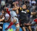 The Crusaders' George Whitelock and the Chiefs' Richard Kahui compete for a high ball 