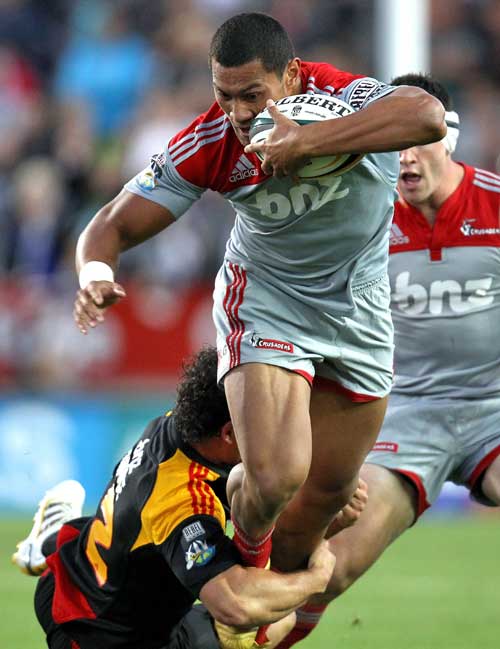 The Crusaders' Robbie Fruean takes on the Chiefs' defence
