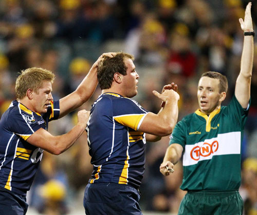 The Brumbies' Ben Alexander celebrates the first of his two tries