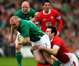 Ireland's Keith Earls breaks through Stephen Jones' tackle, Ireland v Wales, Six Nations, Croke Park, Dublin, Ireland, March 13, 2010