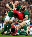 Wales' Jonathan Thomas is shackled by the Irish defence