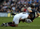 Hugo Southwell is levelled by Mark Cueto's challenge