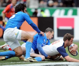 France's Alexandre Lapandry scores a try