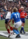 France wing Marc Andreu celebrates his try against Italy