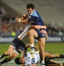 The Blues' Rene Ranger high steps his way through the Brumbies' defence