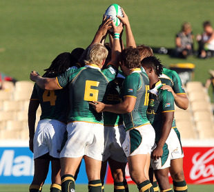 South Africa huddle before their opening match, South Africa v Japan, IRB Sevens World Series, Adelaide, Australia, March 19, 2010.