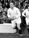 England's Dickie Jeeps leads his side out