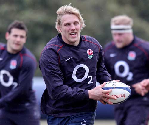 England flanker Lewis Moody passes the ball