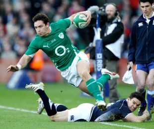 Scottish centre Nick de Luca does enough to stop Ireland's David Wallace during their Six Nations match at Croke Park, Dublin, Ireland, March 20, 2010