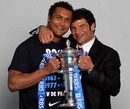 Thierry Dusautoir and Marc Lievremont pose with the Six Nations trophy
