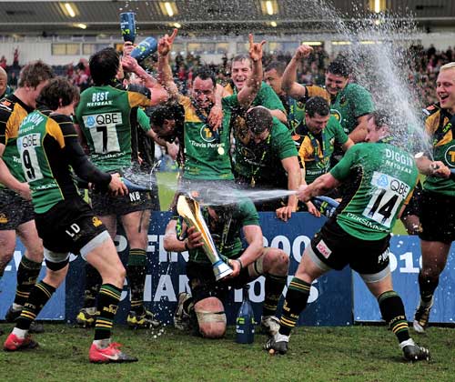 Northampton Saints celebrate winning the Anglo-Welsh Cup