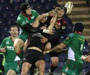 Edinburgh's Ross Rennie and Simon Webster go in pursuit of a high ball