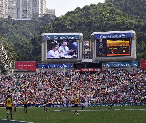 Jacques Rogge is captured on a big screen in Hong Kong