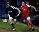 Sale wing Mark Cueto scraps with Rico Gear for a loose ball