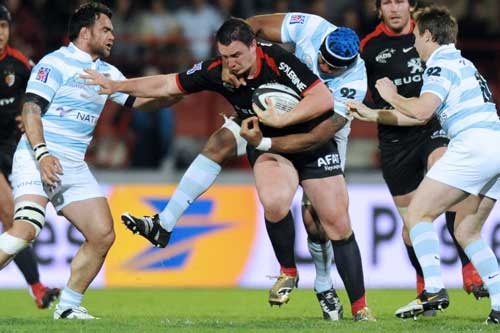 Toulouse No.8 Louis Picamoles is mobbed by the Racing Metro defence