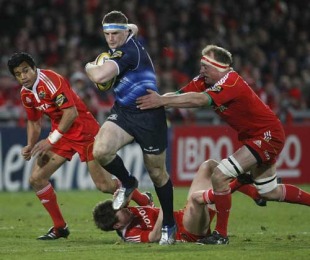 Leinster No.8 Jamie Heaslip is tackled by Mick O'Driscoll, Leinster v Munster, Magners League, Thomond Park, April 2, 2010