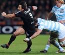 Lionel Nallet clings to Byron Kelleher during Toulouse's win over Racing Metro