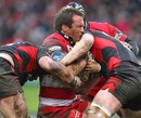 Gloucester's Paul Doran-Jones is tackled by the Saracens defence
