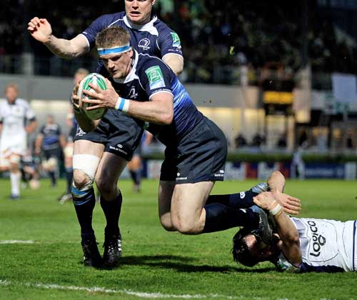 Leinster's Jamie Heaslip powers over for a try