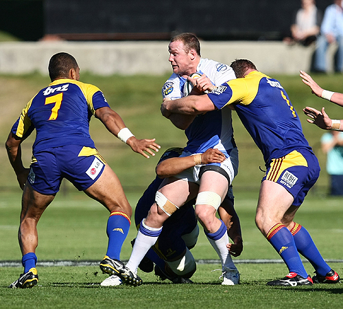 Richard Brown of the Western Force hits the ball up