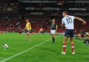 The Reds' Quade Cooper lines up a kick in his trademark style