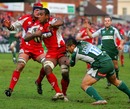 Gloucester's Apolosi Satala is tackled by Elvis Seveali'i