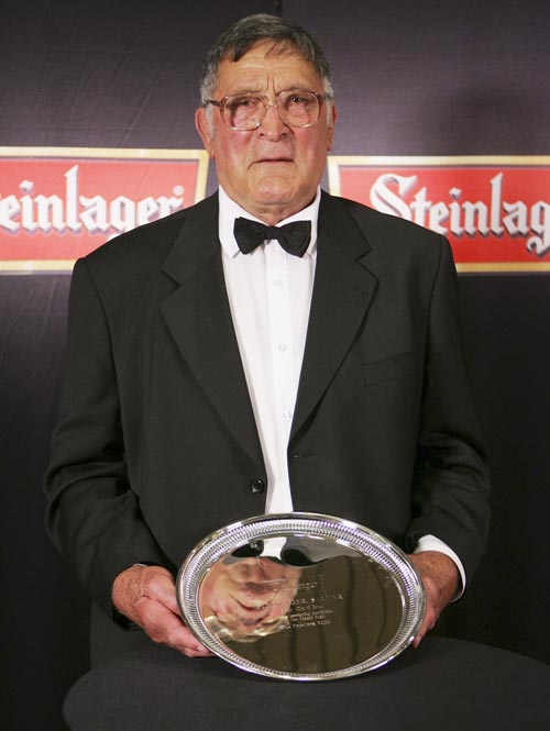 Stan 'Tiny' Hill shows off his Steinlager Salver award
