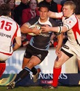Glasgow's Colin Shaw takes on the Ulster defence