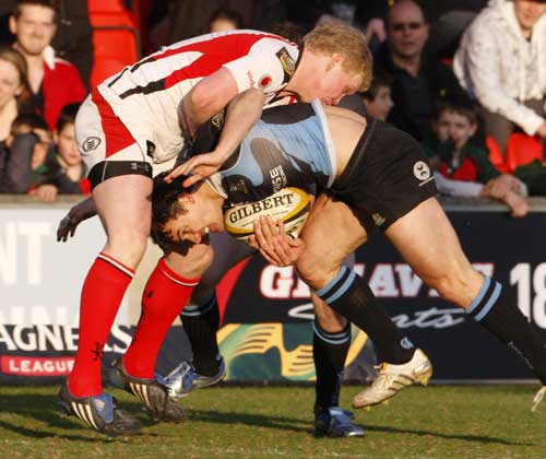 Glasgow's Max Evans is halted by Ulster's Paul Marshall 