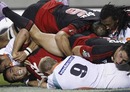 The Crusaders' Kahn Fotuali'i scores a try