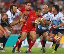 The Reds' Will Genia is the centre of attention