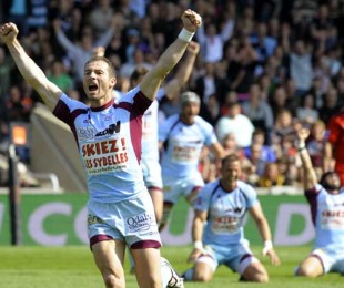 Maël Moinot and the Bourgoin team celebrate their win over Toulouse at Stade Gerland, Lyon, France, April 17, 2010