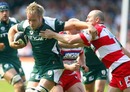 London Irish's Richard Thorpe is shackled by the Gloucester defence