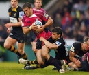 Cardiff Blues centre Jamie Roberts is tackled by Wasps' Dom Waldouck