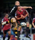 Cardiff Blues' Xavier Rush and Wasps' Mark van Gisbergen compete for a high ball