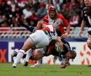 Munster centre Jean de Villiers is upended by Benoit August